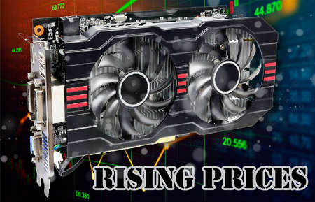 Installing video card in an open case of personal computer. Graphics adapter or graphics card in the hand of a technician. PC assembly and upgrade. orange toneの写真素材