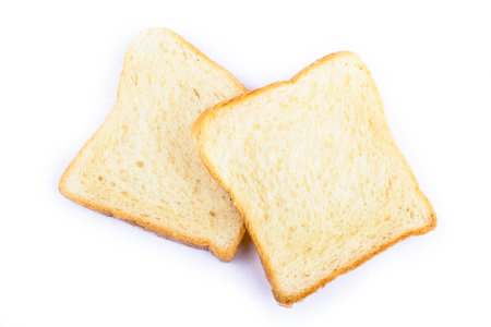 two slices of bread for toast on a white backgroundの写真素材