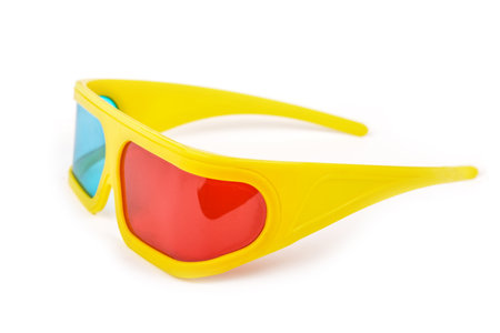 yellow 3d plastic glasses with colored glasses isolated on whiteの写真素材