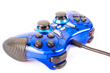 the isolated of the blue joystick for controller and play video game on white backgroundの写真素材