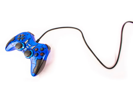 the isolated of the blue joystick for controller and play video game on white backgroundの写真素材