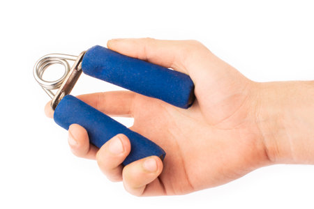 arm with hand expander isolated on white backgroundの写真素材