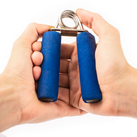 arm with hand expander isolated on white backgroundの写真素材