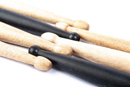 many drum sticks of two colors of black and white isolatesの写真素材