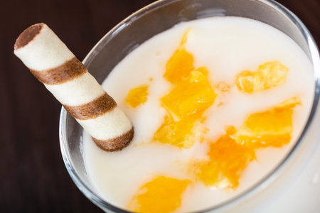 fruit cocktails made of yogurt, Healthy morning drink with sweetness on the background of old wood and bricksの写真素材