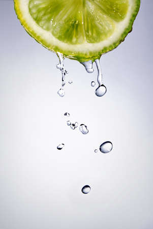 fresh water drops on lemonの写真素材
