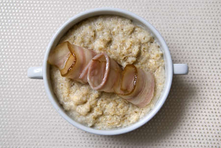 breakfast with oat and baconの写真素材