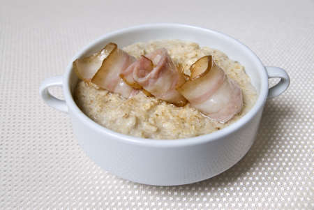breakfast with oat and baconの写真素材