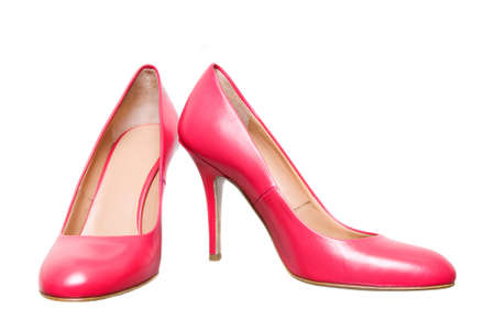 pink leather female shoes isolated on whiteの写真素材