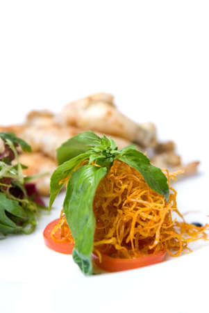 carrot and tomato with green leavesの写真素材