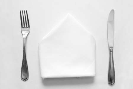 knife, fork and napkin in restaurantの写真素材