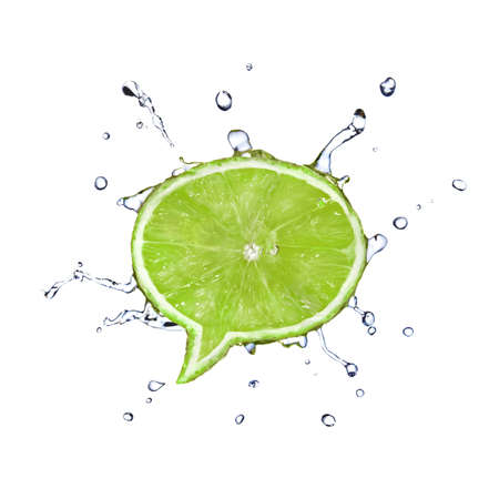 Lime in shape of dialog box with water drops isolated on whiteの写真素材