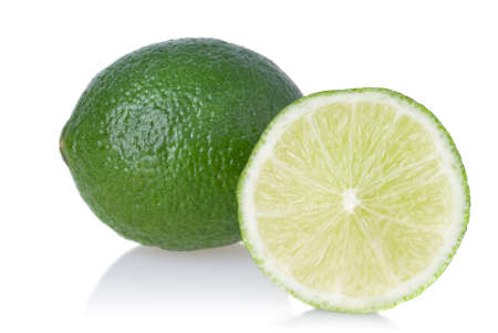 Green lime isolated on whiteの写真素材