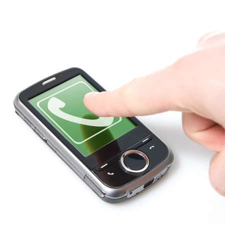 finger and pda with incoming call isolated on whiteの写真素材