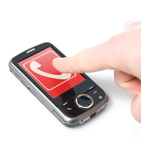 finger and pda with touch screen isolated on whiteの写真素材