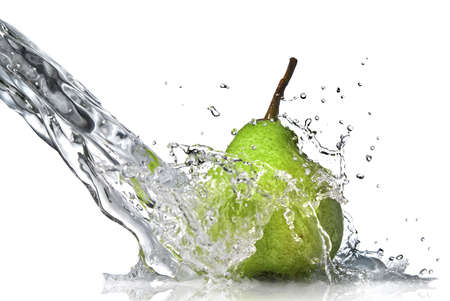 fresh water splash on green pear isolated on whiteの写真素材