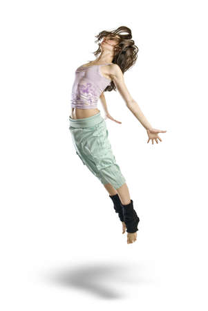 jumping young dancer isolated on white backgroundの写真素材