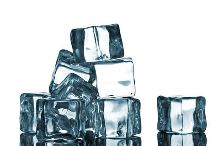 ice cubes with water drops isolated on whiteの写真素材