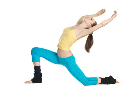 beautiful girl doing gymnastics on white backgroundの写真素材