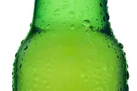 Green beer bottle with water drops isolated on whiteの写真素材