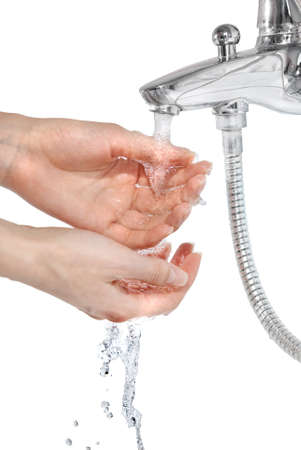 hands with pouring water isolated on whiteの写真素材