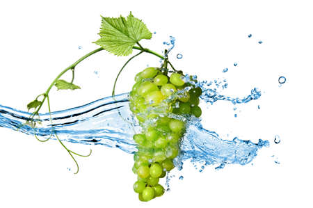 green grape with water with splash isolated on whiteの写真素材