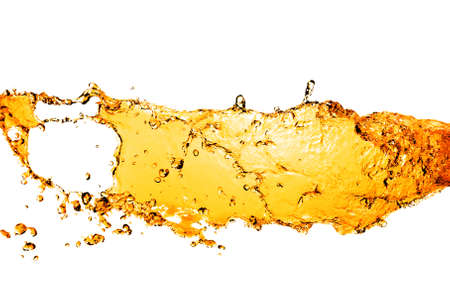 orange water splash isolated on whiteの写真素材