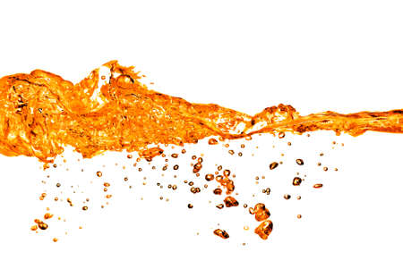orange water splash isolated on whiteの写真素材