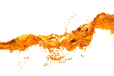 orange water splash isolated on whiteの写真素材