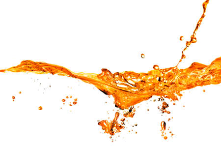 orange water splash isolated on whiteの写真素材