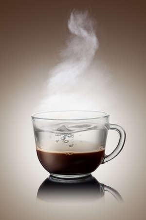 Ð¡offee and water in cup isolated on whiteの写真素材