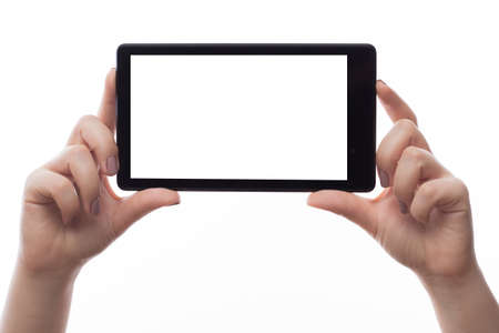 Woman hold tablet PC on white backgroundの写真素材