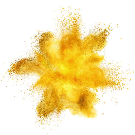 Yellow powder explosion isolated on white backgroundの写真素材