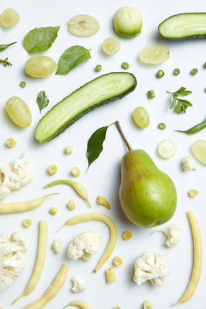 Close up of green vegetables and fruits on background. Healthy eating and food for vegansの写真素材
