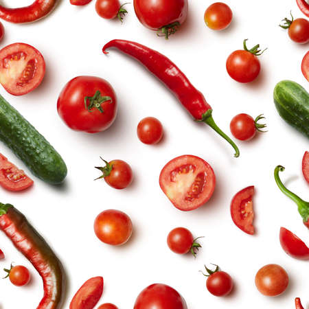 Seamless pattern. Raw vegetables: chili pepper, cucumber and tomato on white background .の写真素材