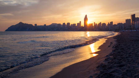 Golden sunset on the Poniente beach in Benidormの写真素材