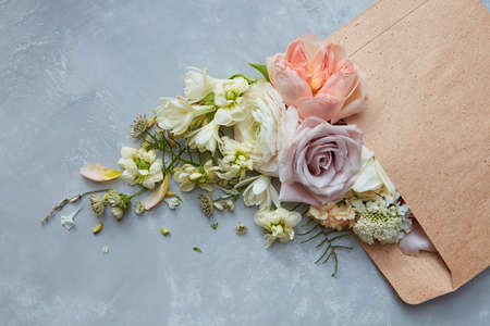 Composition of flowers on grey background