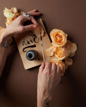 Hand with pen writingの写真素材