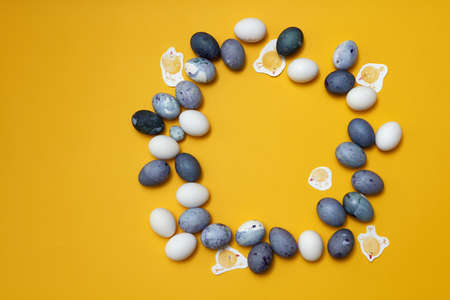 frame of eggs and painted chickensの写真素材