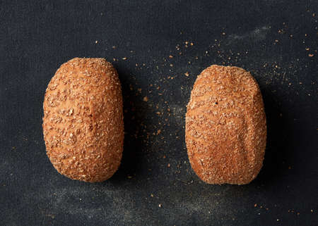 Different kinds of bread on background