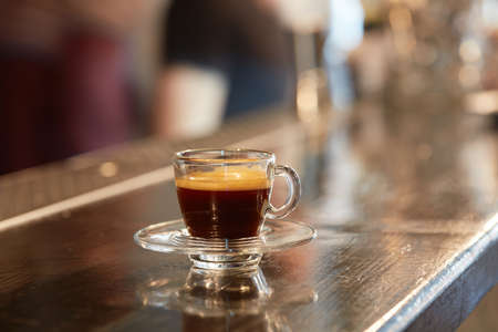 Cup of coffee on bar counterの写真素材