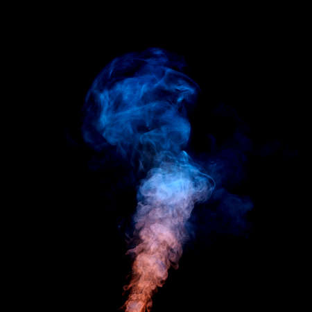 red blue smoke isolated on black background in motionの写真素材
