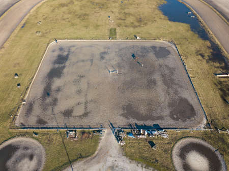 Kiev, Ukraine.- February 02,2018: Aerial view on a hippodrome with a horse, people and shadowsの写真素材