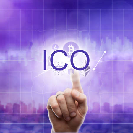 Different icons cryptocurrency: Litecoin, etherium, ripple, bitcoin and hand touches the abbreviation ICO on the ultraviolet background of the cityの写真素材