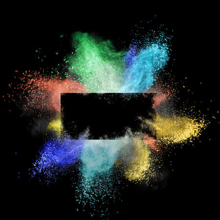 Launched colorful powder around a rectangular frame isolated on black backgroundの写真素材