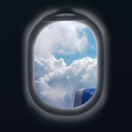 View of cloud and turbine of airplane from windowの写真素材