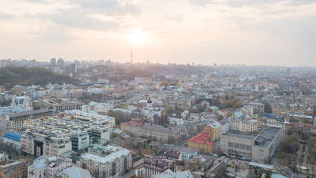 The panoramic birds eye view from drone to the central historical part of Kiev, Ukraine - the Podol district, the district of Dorohozhychi at summer sunset.の写真素材