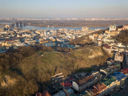A birds eye view, aerial view from drone of the Podol district, oldest historical center of Kiev,...