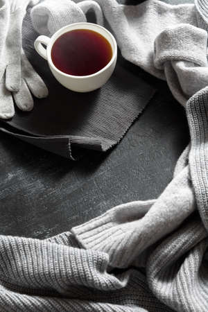 clothes from knitted and cup of drinkの写真素材