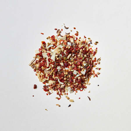 Colorful pattern of a mixed of fragrant natural spices for cooking meat on a white background.の写真素材